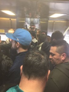 Crowded Caltrain car. Courtesy @Caltrain_News