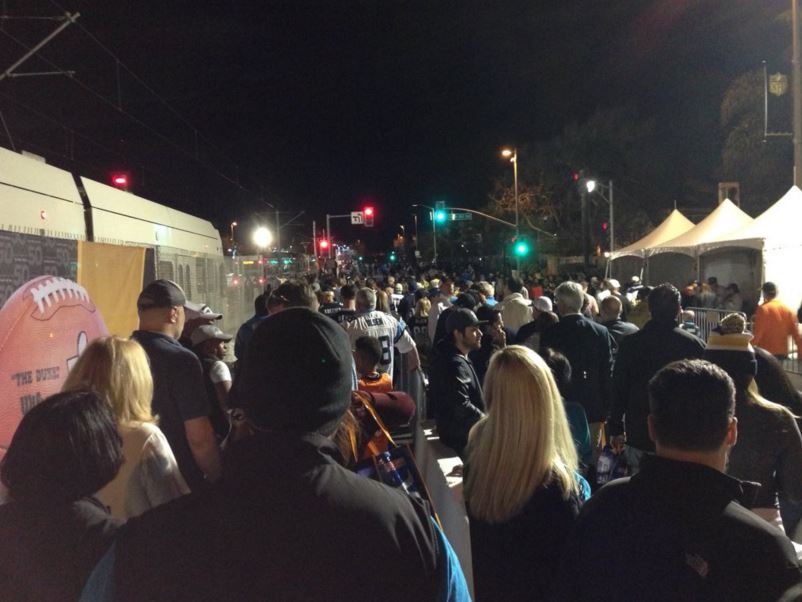 Super Bowl 50 fans go to waiting VTA light rail trains after the game has ended. Photo courtesy @spizarro on Twitter.