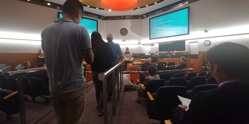 People wait to speak at a VTA Board meeting in San Jose.